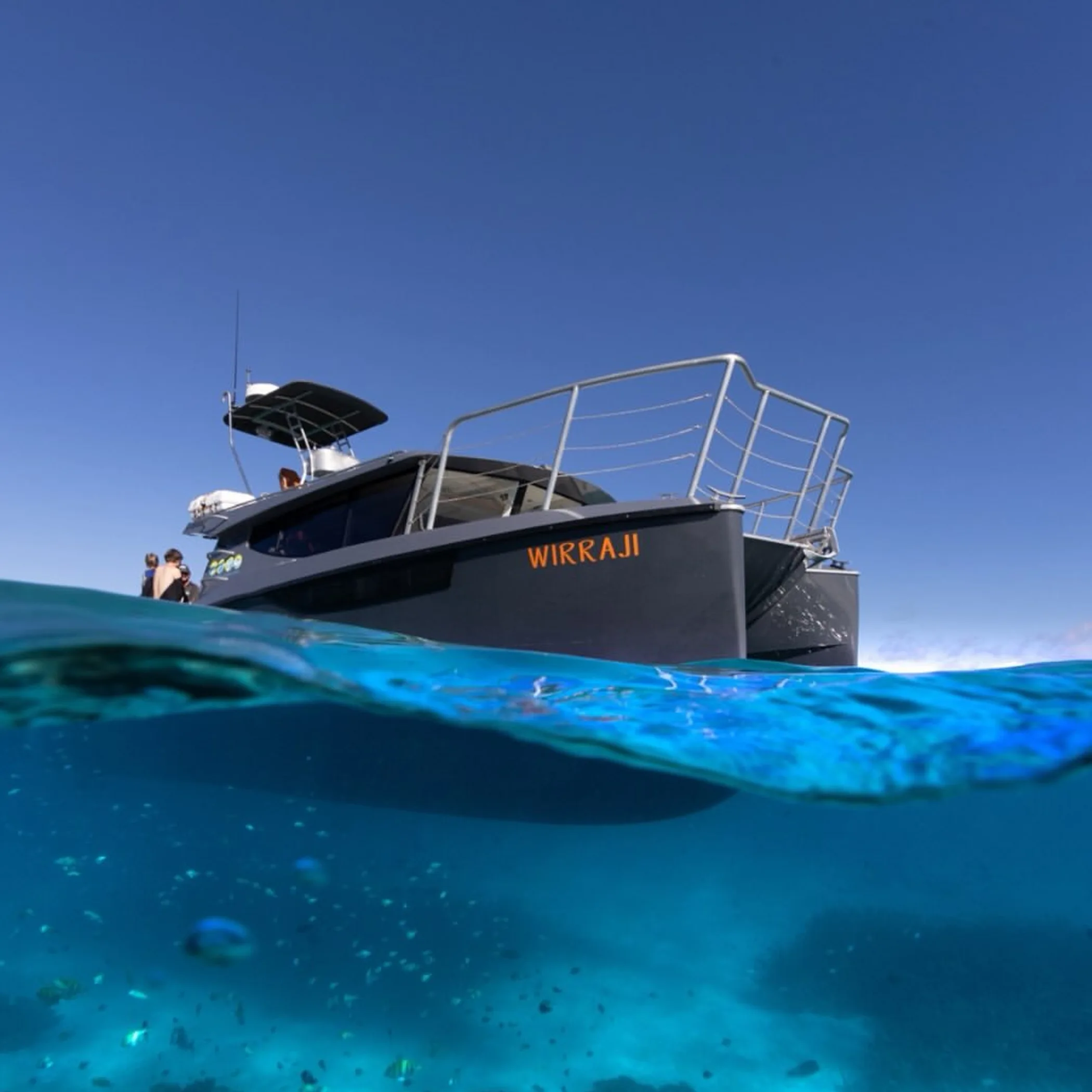 boat near coral reef